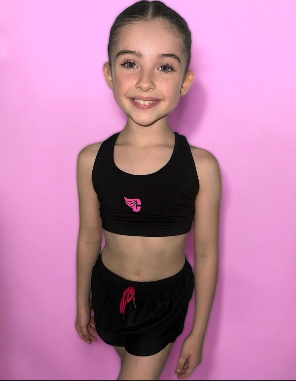 Cirkis Essentials Girls Pink Cross Strap Crop Top.